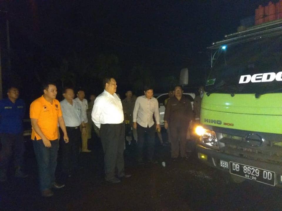 Keberangkatan 20 Truck bantuan pemkab Minsel menuju Kota Palu dibawah dipimpin Kepala Badan BPBD DR. Meidy Maindoka dilepas langsung oleh Sekretaris Daerah Denny Kaawoan.